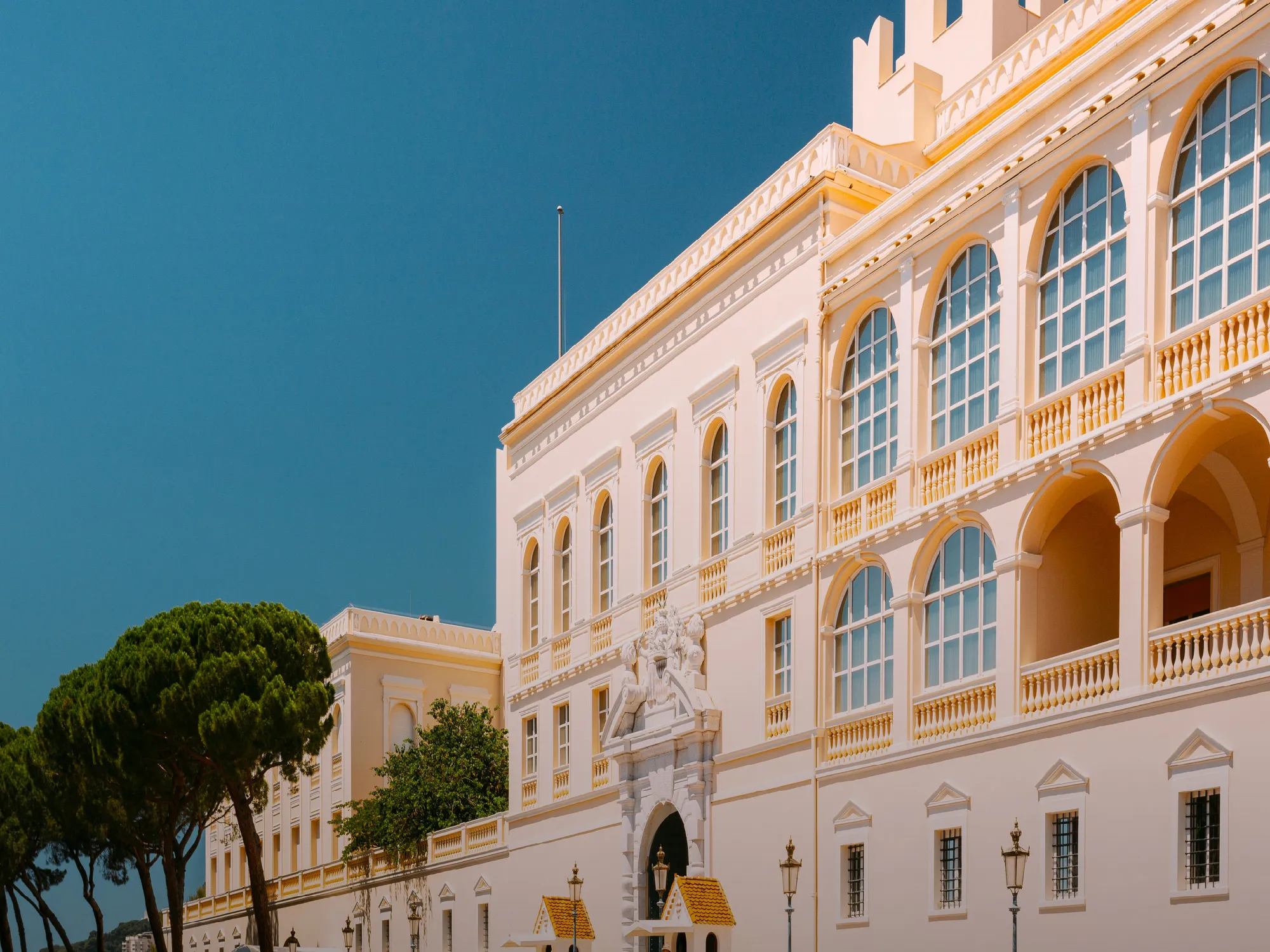 Grand Royal Monaco casino hotel facade with sign reading Grand Royal Monaco